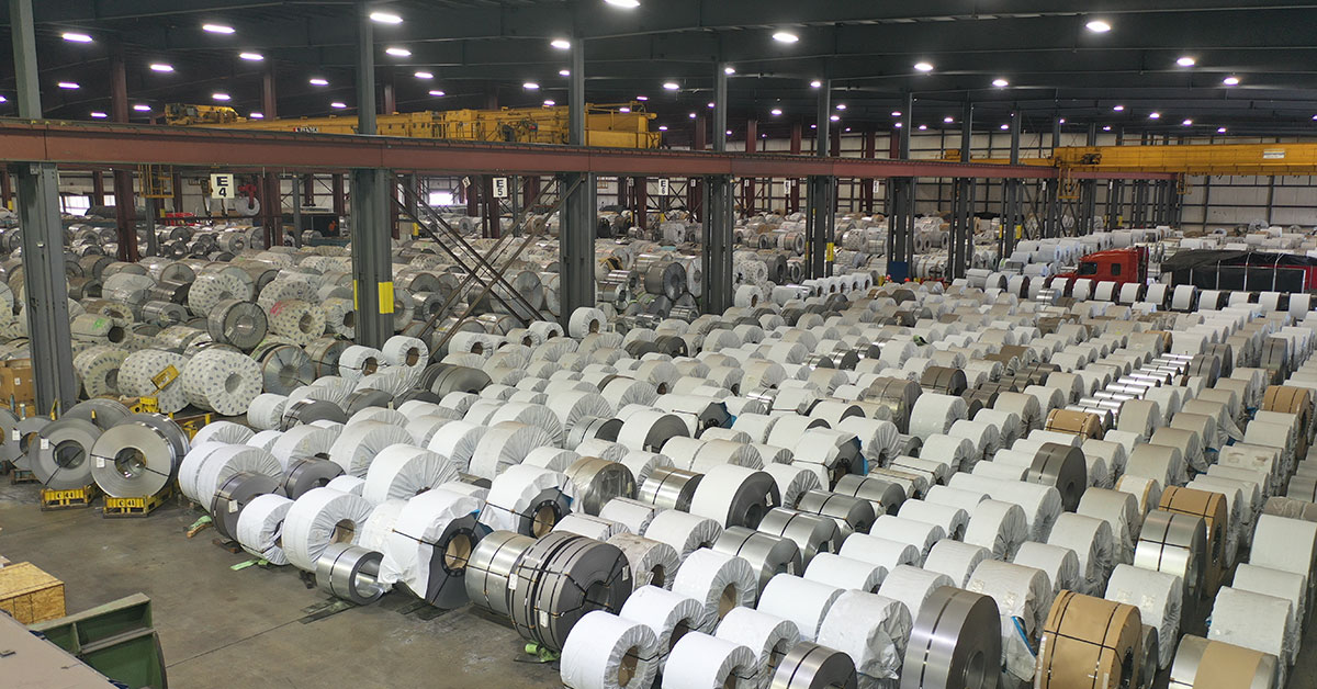 a warehouse full of metals ready to be shipped