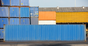 shipping containers stacked in a port