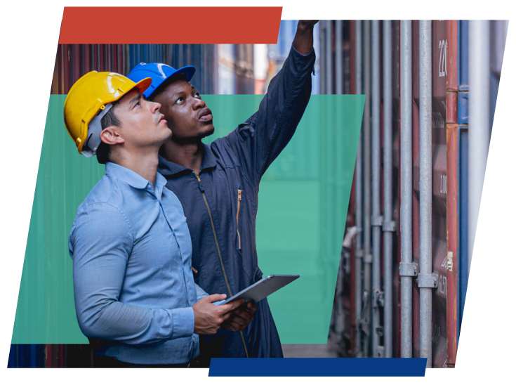 men looking at a container shipment holding a tablet