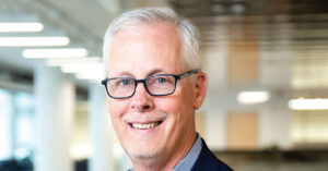 headshot of Glenn Riggs the Chief Strategy Officer at Odyssey Logistics