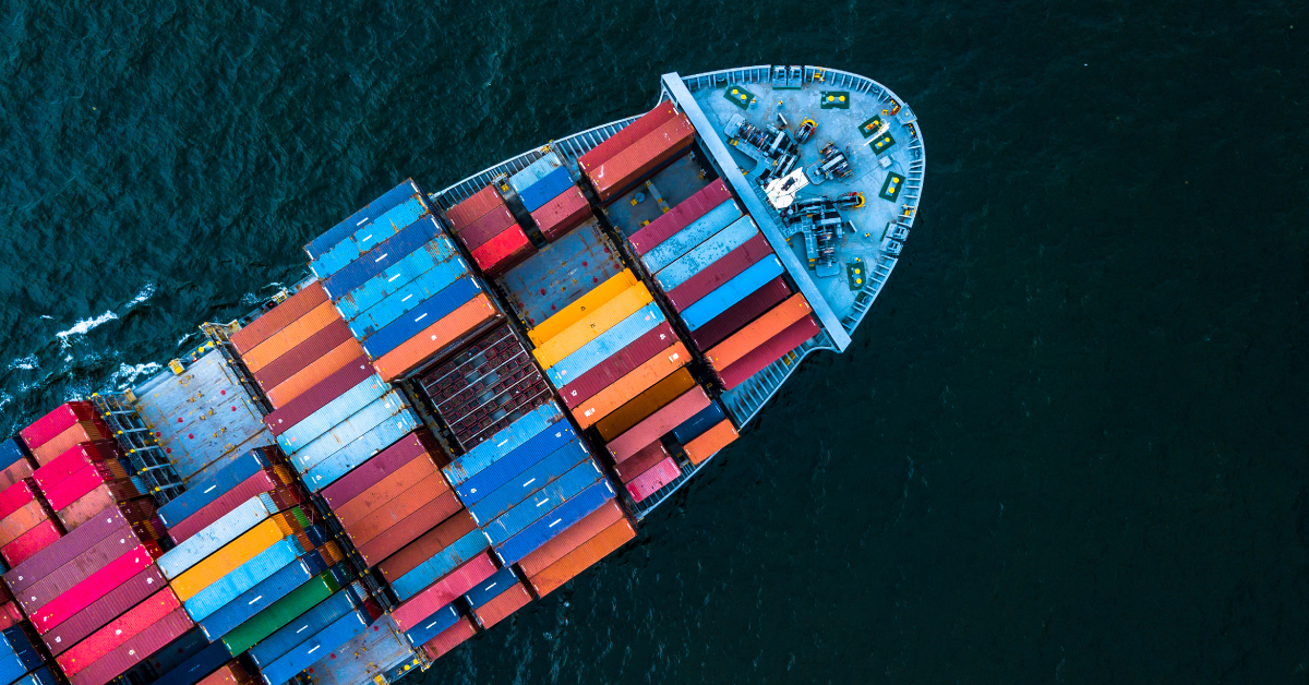 A ship in the ocean loaded with shipping containers