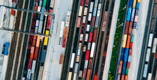 aerial view of containers on flat cars