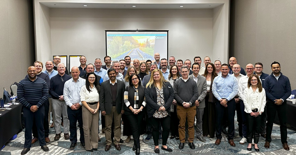 a group of Odyssey employees standing together
