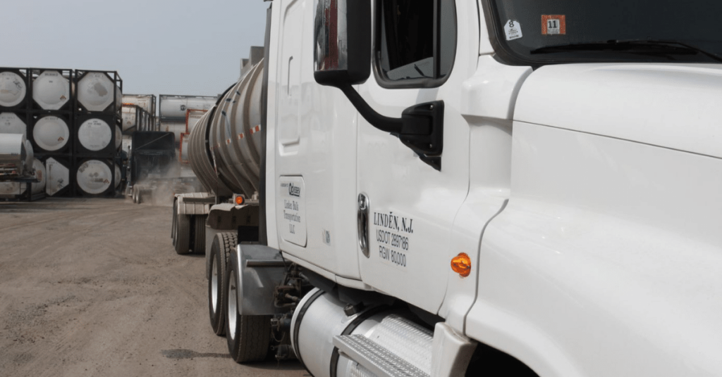 white semi truck and trailer